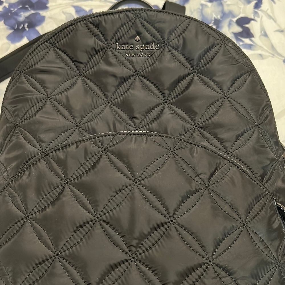 Excellent condition Kate Spade black quilted back pack.